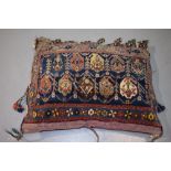 Afshar 'boteh' piled bag, now stuffed as a cushion, Kerman area, south west Persia, early 20th