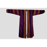 Two silk satin robes, Uzbekistan or Afghanistan, 20th century, one principally purple with stripes