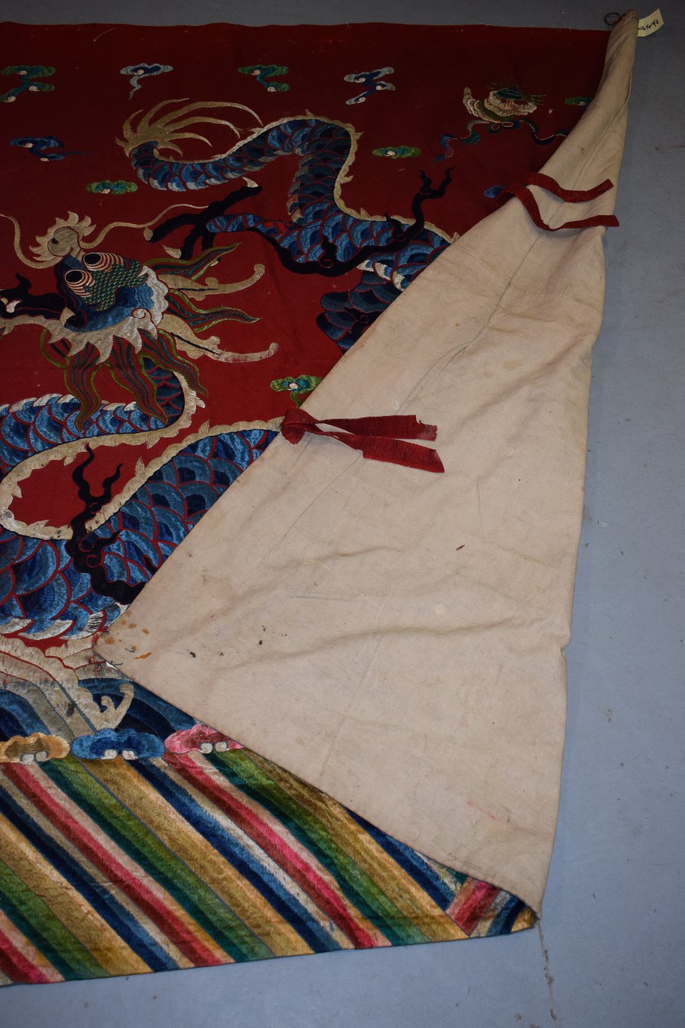 Chinese temple hanging, late 19th century, 60in. x 128in. 153cm. x 325cm. Red felted wool ground - Image 9 of 9