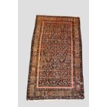 Two north west Persian rugs, the first a Feraghan, early 20th century 7ft. 9in. X 4ft. 2in. 2.36m. X