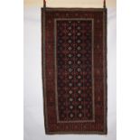 Baluchi rug, Khorasan, north east Persia, late 19th/early 20th centurty, 6ft. 6in. X 3ft. 4in. 1.