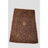 Kashan rug, west Persia, circa 1920s, 6ft. 9in. x 4ft. 3in. 2.05m. x 1.30m. Classic design with pale