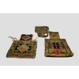 Eight Kurdish weavings, north west Persia, first half 20th century, comprising six salt bags, and