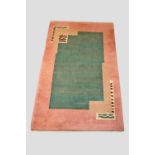 Art Deco rug of geometric design, 20th century, 7ft. 10in. x 4ft. 9in. 2.39m. x 1.45m. Light green