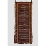 Kurdish boteh long rug, north west Persia, early 20th century, 7ft. 4in. X 3ft. 1in. 2.24m. X 0.94m.