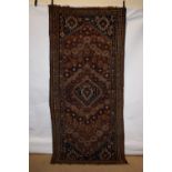 Fars long rug, Shiraz area, south west Persia, circa 1930s-40s, 9ft. 7in. X 4ft. 5in. 2.92m. X 1.