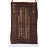 Baluchi prayer rug, Khorassan, north east Persia, early 20th century, 4ft. 7in. X 3ft. 1in. 1.40m. X
