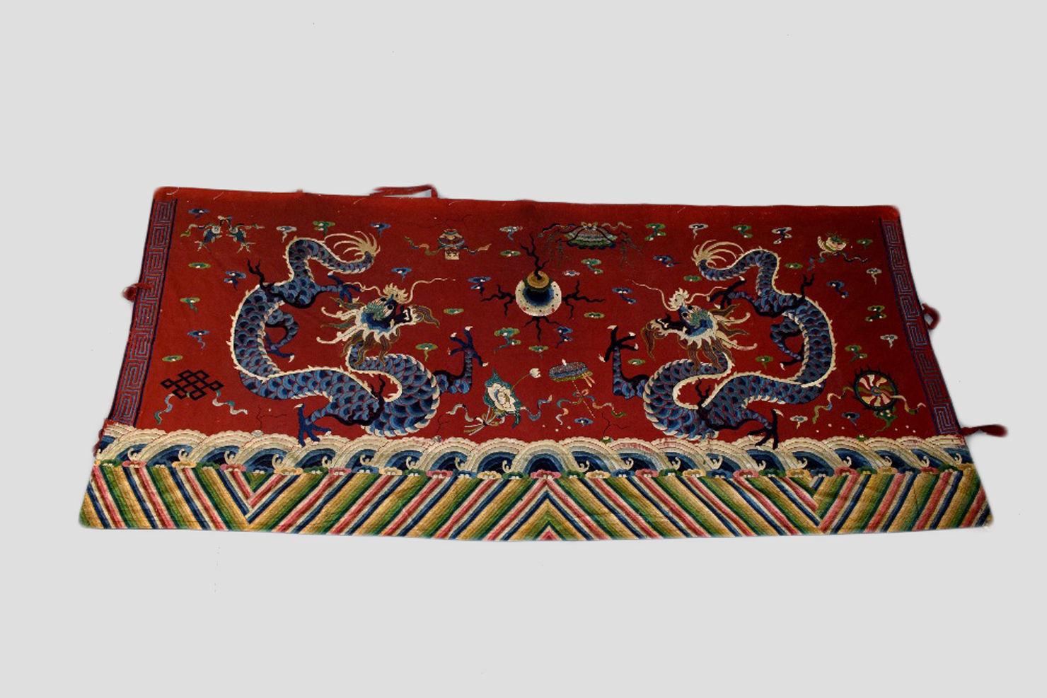 Chinese temple hanging, late 19th century, 60in. x 128in. 153cm. x 325cm. Red felted wool ground