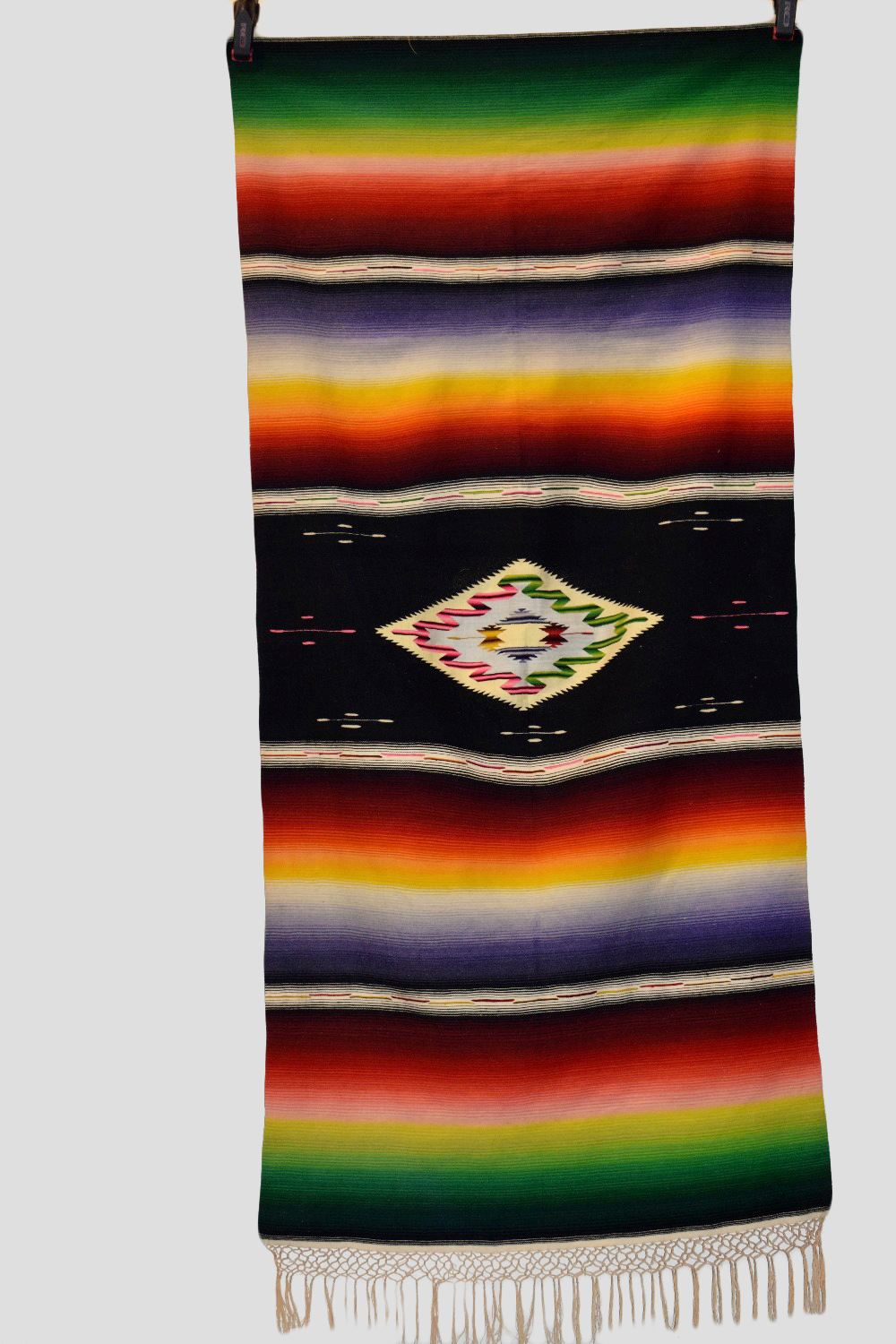 Mexican serape blanket, north America, mid-20th century, 68in. X 32in. 1.73m. X 0.81m. Woven in