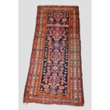 Malayer long rug, north west Persia, circa 1920s, 8ft. 2in. X 3ft. 5in. 2.49m. X 1.04m. Overall