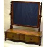 A Regency mahogany rectangular swing toilet mirror, the glass on ring turned supports, inverted