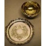 A Victorian silver sugar bowl, with repousse swags of fruit, the interior gilded, on a moulded foot.