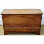 A mid nineteenth century elm blanket chest, with later sewing trays, a base drawer with brass swan