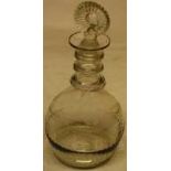 A late eighteenth century Irish glass decanter, engraved arbutus and swags, part fluted, a moulded