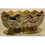 A Victorian oval silver verrier, the scalloped edge sides with a cable edge, repousse ribboned