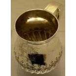 A William and Mary baluster mug, engraved a mid