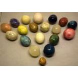 A collection of eighteen coloured ornamental eggs, alabaster agate and marble, one 1.5in (4cm)