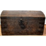 A Carolean leather bound travelling trunk, with a domed hinged lid, brass nailing of flowers,