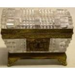 A French early nineteenth century cut glass casket, (lid cracked) with gilt brass mounts, a