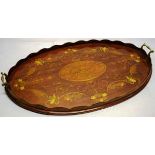 A late Victorian oval marquetry inlaid mahogany tray, the centre with a cowrie shell and fan