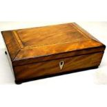 A Regency faded mahogany veneered sarcophagus shape work box, bordered with ebony stringing, the
