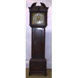 An oak longcase clock, the 8 day movement striking on a bell, the back plate inscribed W.E Atherton,