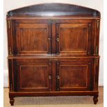 A Regency rosewood veneered dwarf cabinet, the top with a gallery above a compartment with a pair of