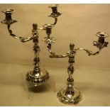 A pair of Swedish cast plated candelabra, in mid eighteenth century French taste, with twin fluted