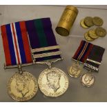 A pair of medals awarded to the late Major John C Turner, the Defence medal and George VI service