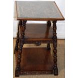 A late nineteenth century walnut etagere, the square top with an intense geometric carved pattern,
