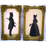 A pair of early Victorian full length silhouette portraits of a Mr Benjamin Smith (the