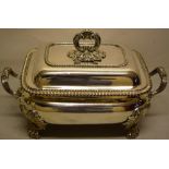 A George IV silver rectangular soup tureen, the ogee sides with two tulip tied moulded handles,