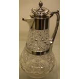 A late Victorian glass claret jug, the baluster body with hobnail trellis and tablet cutting, the
