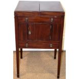 A Regency mahogany washstand, the twin flap top reveals a bowl stand, the front with ebony