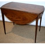 An early nineteenth century mahogany Pembroke table, inlaid stringing, the banded oval drop leaf