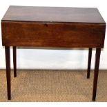 A late eighteenth century mahogany Pembroke table, the rectangular drop leaf top, above a drawer