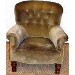 An easy armchair by Maple & Co, upholstered button back faded olive green dralon, on front turned