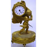 A French Louis Philipe ormolu boudoir timepiece of a cherub carrying a bow in one hand and a cloak