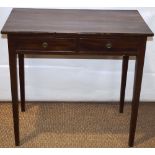 A late eighteenth century mahogany side table, the two drawers with brass ring handles, on square