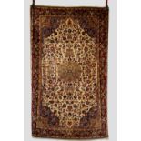 Saruk rug with ivory field, north west Persia, circa 1940s,. 6ft. 8in. x 4ft. 2in. 2.03m. x 1.27m.