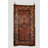 Two rugs comprising: Kazak rug, south west Caucasus, circa 1920s-30s, 7ft. X 3ft. 9in. 2.13m. X 1.