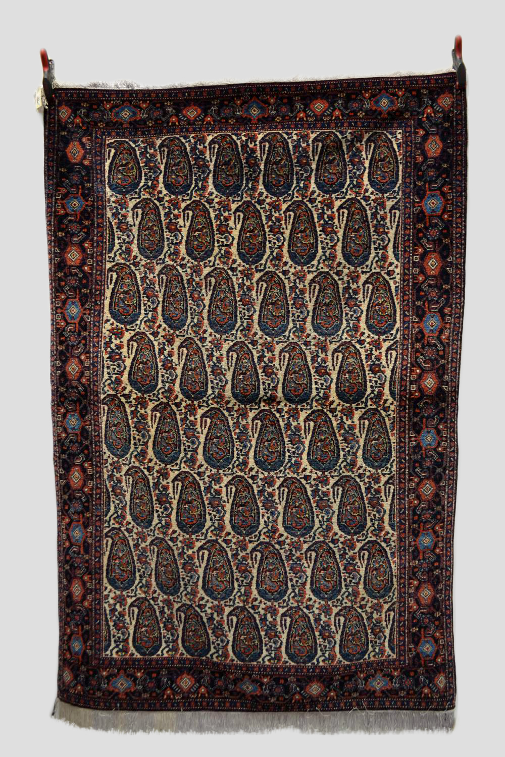 Senneh ivory field 'boteh' rug, wool pile on a silk foundation, Hamadan area, north west Persia,