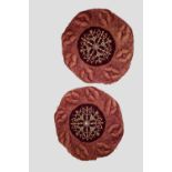 Two Ottoman cushion covers, early 20th century, 29in. 74cm. dia. red velvet centres embroidered in