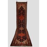 Malayer runner, north west Persia, circa 1930s-40s, 17ft. 6in. X 3ft. 7in. 5.34m. X 1.09m. Overall