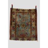 Agra rug, north India, early 20th century, 3ft. 8in. X 3ft. 2in. 1.12m. X 0.97m. Part of the main