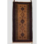 Four flatwoven rugs comprising a Baluchi sofreh, north east Persia, circa 1930s, 5ft. X 2ft. 6in.