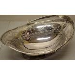 An Irish late eighteenth century oval silver cake basket, in the Adam taste, the sides with