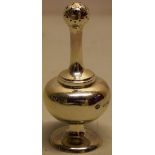 A Victorian silver scent sprinkler, the well with a screw on stem, with a pierced bulbous top, on