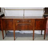 A pair of late nineteenth century mahogany breakfront sideboards, inlaid with chequer stringing, one