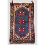 Two Anatolian rugs, mid-20th century, the first 4ft. 5in. X 3ft. 4in. 1.35m. X 1.02m. Two blue